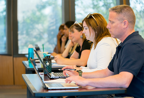 An image of adult students in a classroom.